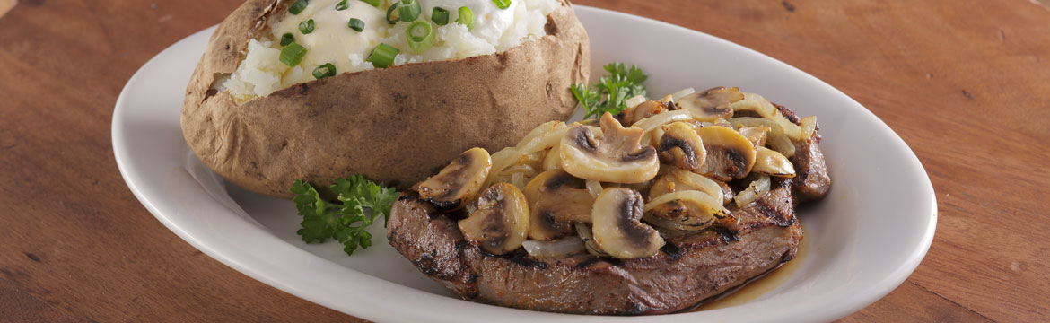 Sirloin topped with sautèed mushrooms & onions Sirloin topped with sauteed mushrooms and onions